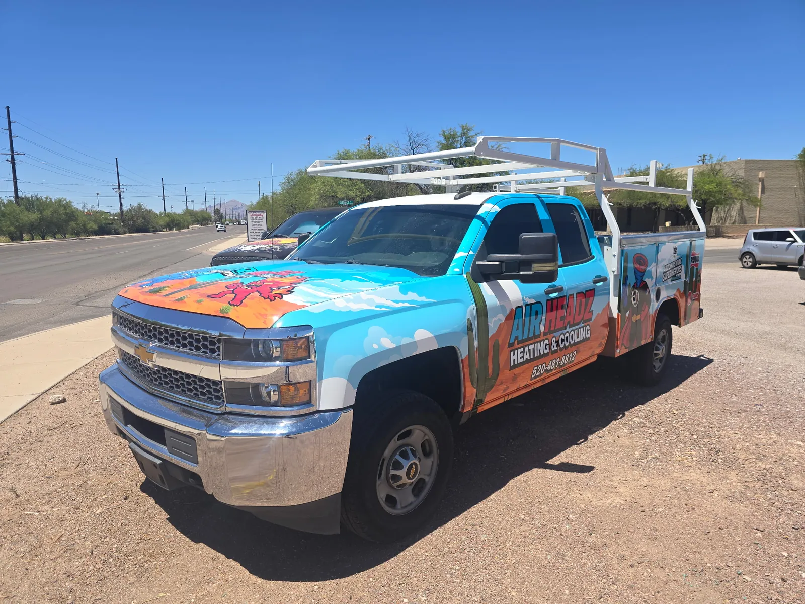 AirHeadz service truck loaded with ladder rack and equipment